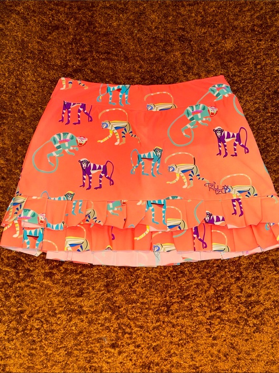 Tzu Tzu Dresses & Skirts - Tzu Tzu Coral Mini Skirt with Multicolor Monkey Motif
